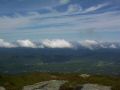 Looking down on the clouds and the surrounding peaks.jpg